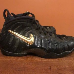Black and gold Nike Foamposite Shoes